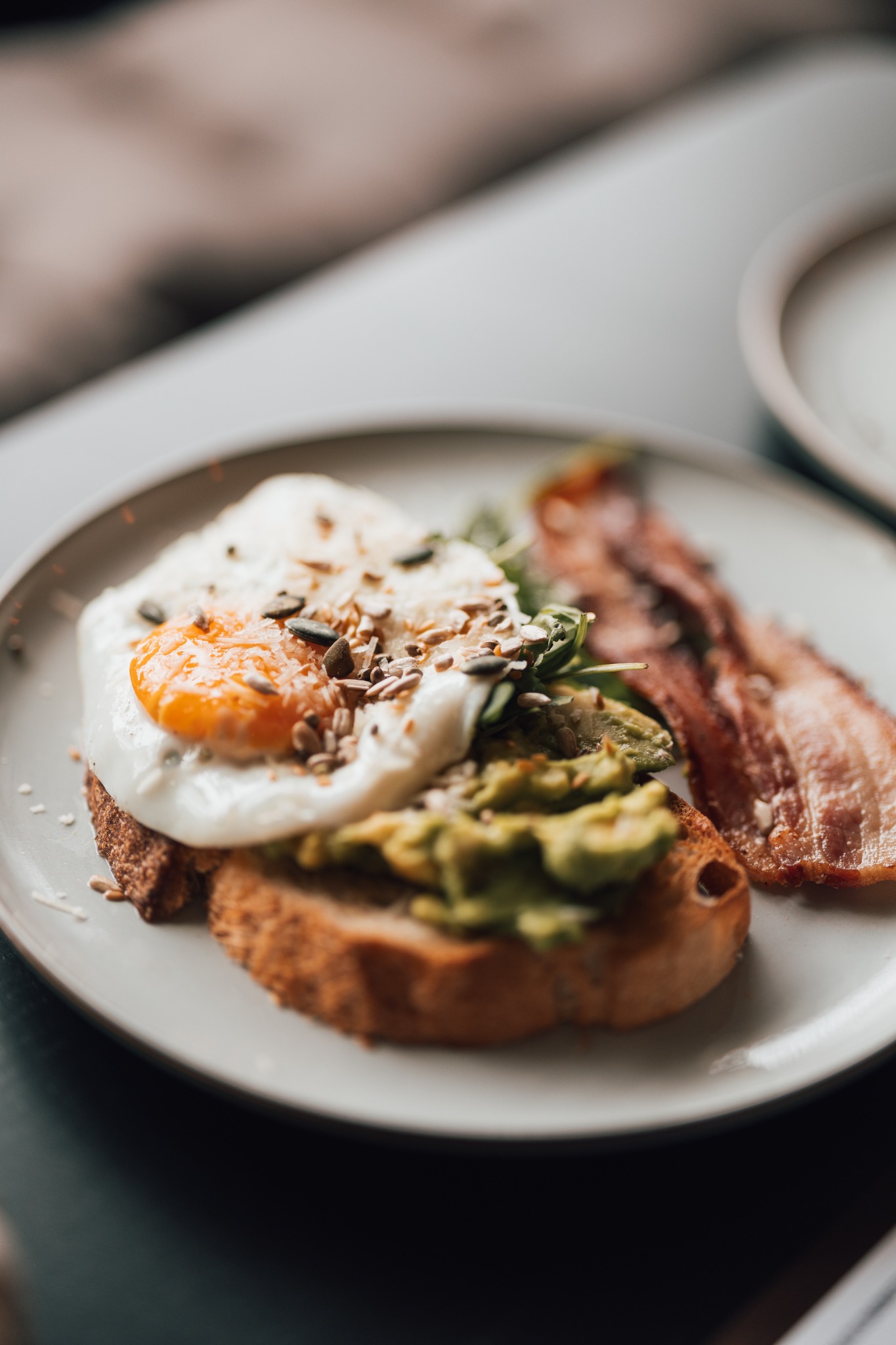 Avocado toast with egg and bacon